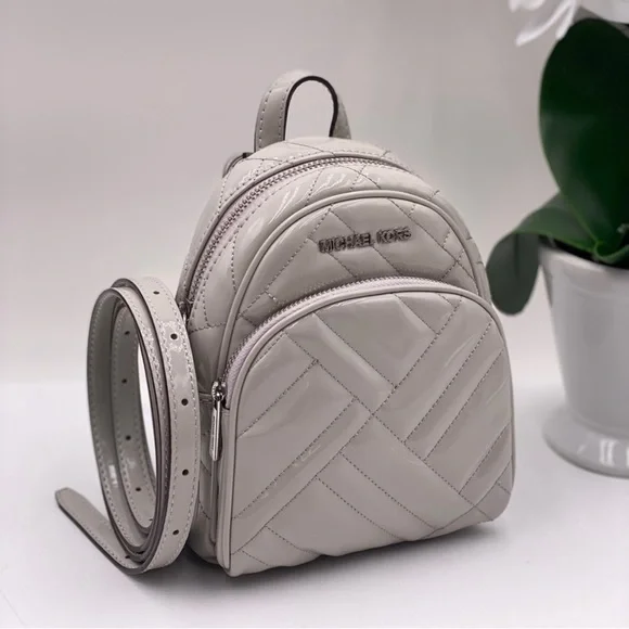 Michael Kors Abby Mini Backpack/Crossbody - Picture 1 of 8